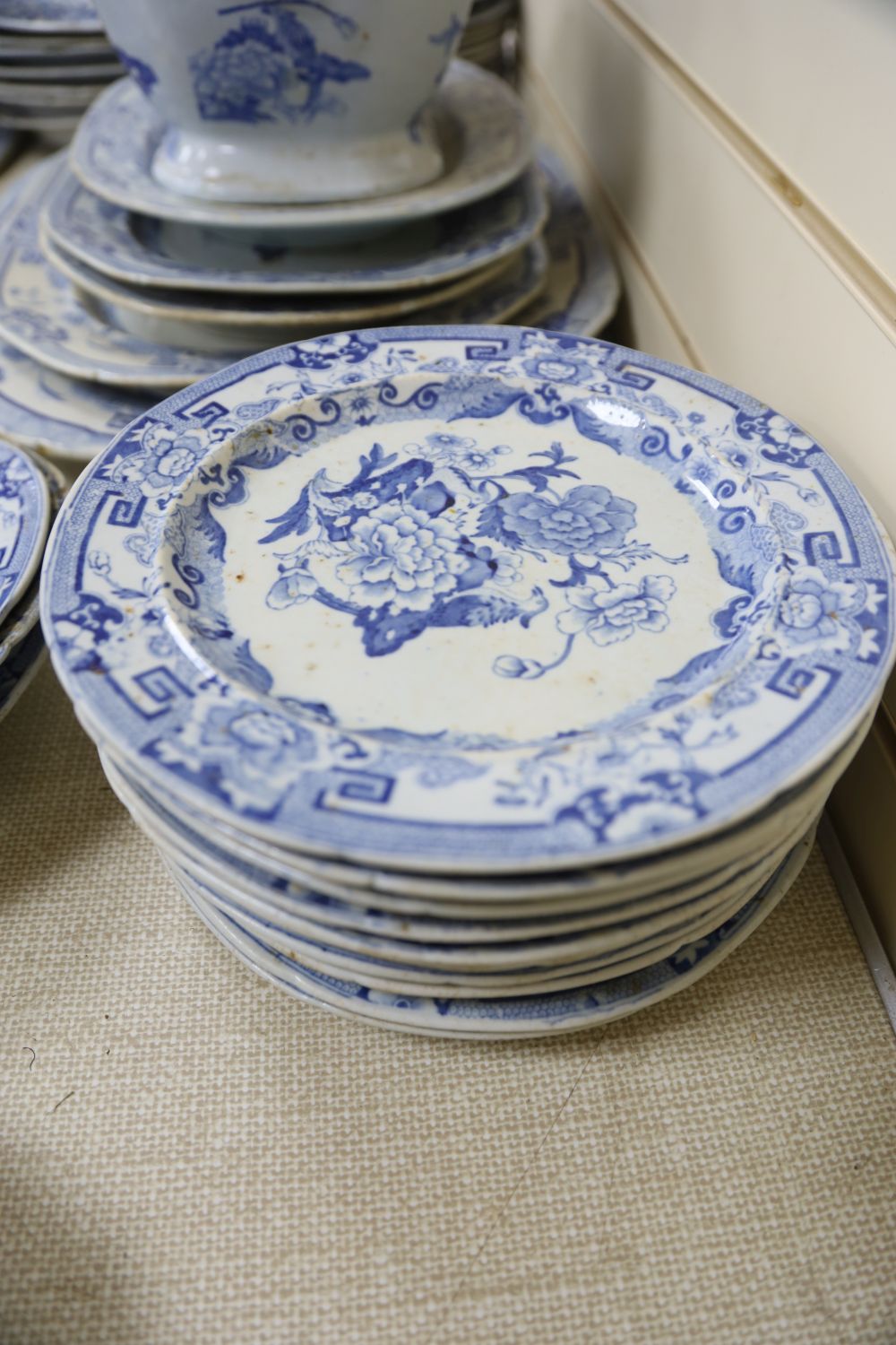 A mid 19th century Masons ironstone blue pheasant pattern 57 piece part dinner service